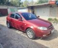 Красный Шевроле Лачетти, объемом двигателя 1.8 л и пробегом 202 тыс. км за 4400 $, фото 1 на Automoto.ua