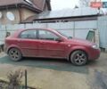 Красный Шевроле Лачетти, объемом двигателя 1.6 л и пробегом 230 тыс. км за 3200 $, фото 1 на Automoto.ua