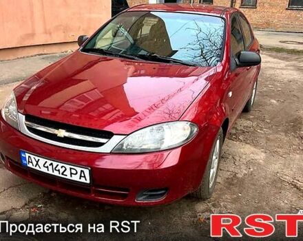 Красный Шевроле Лачетти, объемом двигателя 1.4 л и пробегом 200 тыс. км за 4000 $, фото 1 на Automoto.ua