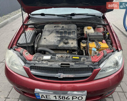 Красный Шевроле Лачетти, объемом двигателя 1.6 л и пробегом 251 тыс. км за 4000 $, фото 35 на Automoto.ua