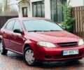 Червоний Шевроле Лачетті, об'ємом двигуна 1.6 л та пробігом 200 тис. км за 3850 $, фото 1 на Automoto.ua