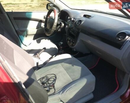 Красный Шевроле Лачетти, объемом двигателя 1.6 л и пробегом 303 тыс. км за 3300 $, фото 3 на Automoto.ua