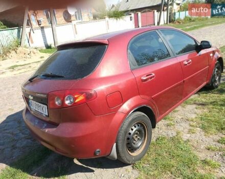 Красный Шевроле Лачетти, объемом двигателя 1.6 л и пробегом 303 тыс. км за 3300 $, фото 7 на Automoto.ua