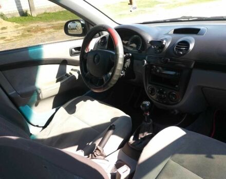 Красный Шевроле Лачетти, объемом двигателя 1.6 л и пробегом 303 тыс. км за 3300 $, фото 5 на Automoto.ua