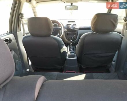 Красный Шевроле Лачетти, объемом двигателя 1.6 л и пробегом 303 тыс. км за 3300 $, фото 10 на Automoto.ua