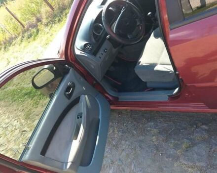 Красный Шевроле Лачетти, объемом двигателя 1.6 л и пробегом 303 тыс. км за 3300 $, фото 5 на Automoto.ua