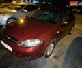 Красный Шевроле Лачетти, объемом двигателя 1.6 л и пробегом 200 тыс. км за 3350 $, фото 1 на Automoto.ua