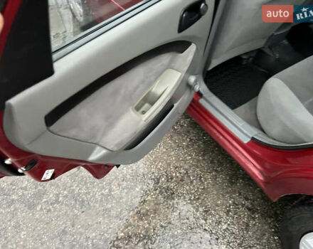 Красный Шевроле Лачетти, объемом двигателя 1.6 л и пробегом 200 тыс. км за 3350 $, фото 5 на Automoto.ua