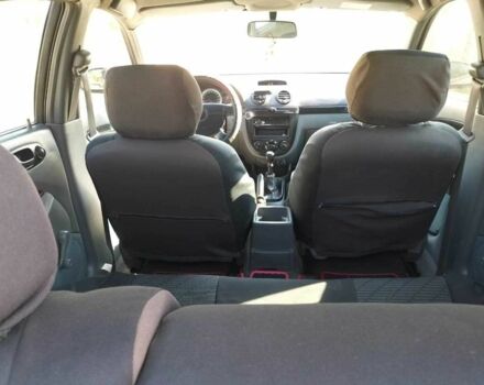 Красный Шевроле Лачетти, объемом двигателя 1.6 л и пробегом 303 тыс. км за 3300 $, фото 10 на Automoto.ua