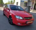Красный Шевроле Лачетти, объемом двигателя 1.4 л и пробегом 150 тыс. км за 4500 $, фото 1 на Automoto.ua