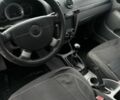 Красный Шевроле Лачетти, объемом двигателя 1.6 л и пробегом 315 тыс. км за 3900 $, фото 5 на Automoto.ua
