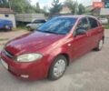 Красный Шевроле Лачетти, объемом двигателя 1.6 л и пробегом 300 тыс. км за 2800 $, фото 1 на Automoto.ua