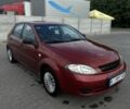 Красный Шевроле Лачетти, объемом двигателя 1.6 л и пробегом 315 тыс. км за 3900 $, фото 1 на Automoto.ua