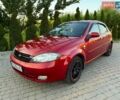Красный Шевроле Лачетти, объемом двигателя 1.8 л и пробегом 190 тыс. км за 4600 $, фото 1 на Automoto.ua