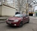 Красный Шевроле Лачетти, объемом двигателя 1.8 л и пробегом 190 тыс. км за 3000 $, фото 1 на Automoto.ua