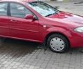 Красный Шевроле Лачетти, объемом двигателя 1.6 л и пробегом 133 тыс. км за 5000 $, фото 1 на Automoto.ua