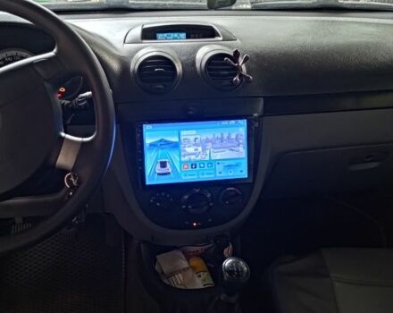 Красный Шевроле Лачетти, объемом двигателя 1.6 л и пробегом 133 тыс. км за 5000 $, фото 5 на Automoto.ua