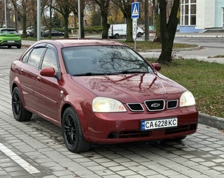 Красный Шевроле Лачетти, объемом двигателя 1.8 л и пробегом 230 тыс. км за 3550 $, фото 1 на Automoto.ua