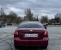 Красный Шевроле Лачетти, объемом двигателя 1.6 л и пробегом 222 тыс. км за 3999 $, фото 4 на Automoto.ua