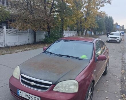 Красный Шевроле Лачетти, объемом двигателя 1.8 л и пробегом 287 тыс. км за 3300 $, фото 4 на Automoto.ua
