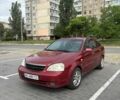 Красный Шевроле Лачетти, объемом двигателя 1.8 л и пробегом 350 тыс. км за 2200 $, фото 1 на Automoto.ua