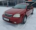 Красный Шевроле Лачетти, объемом двигателя 1.6 л и пробегом 280 тыс. км за 3100 $, фото 1 на Automoto.ua