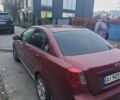 Красный Шевроле Лачетти, объемом двигателя 1.8 л и пробегом 287 тыс. км за 3300 $, фото 2 на Automoto.ua