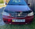 Червоний Шевроле Лачетті, об'ємом двигуна 1.8 л та пробігом 320 тис. км за 2700 $, фото 1 на Automoto.ua