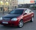 Красный Шевроле Лачетти, объемом двигателя 1.8 л и пробегом 299 тыс. км за 2999 $, фото 1 на Automoto.ua