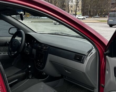 Красный Шевроле Лачетти, объемом двигателя 1.6 л и пробегом 222 тыс. км за 3999 $, фото 11 на Automoto.ua