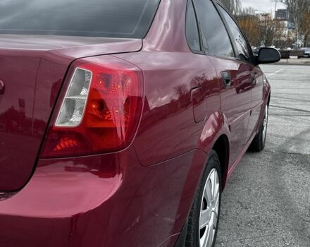 Красный Шевроле Лачетти, объемом двигателя 1.6 л и пробегом 222 тыс. км за 3999 $, фото 6 на Automoto.ua