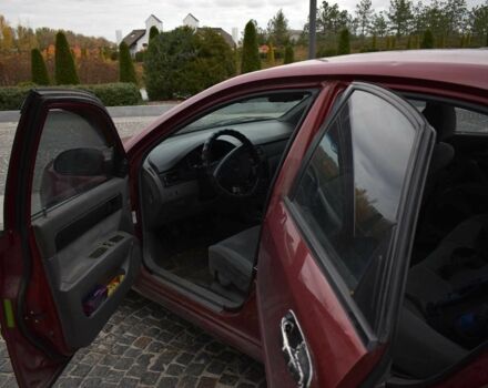 Красный Шевроле Лачетти, объемом двигателя 1.8 л и пробегом 365 тыс. км за 2800 $, фото 8 на Automoto.ua