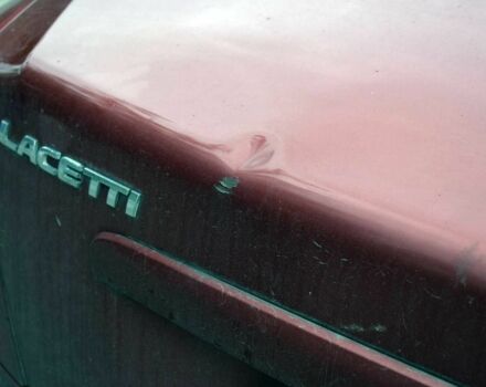 Красный Шевроле Лачетти, объемом двигателя 1.8 л и пробегом 365 тыс. км за 2800 $, фото 16 на Automoto.ua