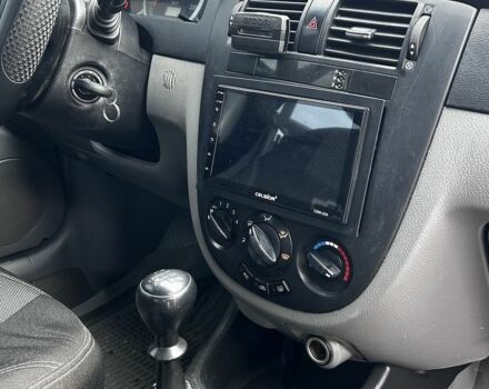 Красный Шевроле Лачетти, объемом двигателя 1.6 л и пробегом 222 тыс. км за 3999 $, фото 13 на Automoto.ua