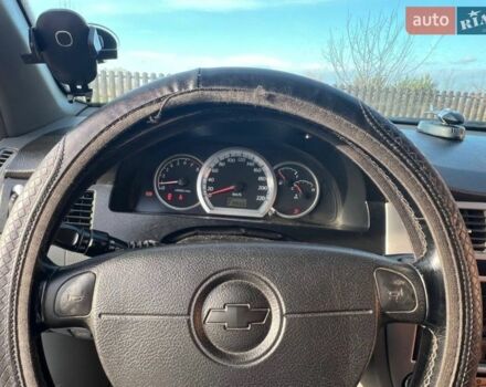 Красный Шевроле Лачетти, объемом двигателя 1.8 л и пробегом 328 тыс. км за 1800 $, фото 1 на Automoto.ua