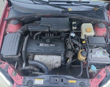 Красный Шевроле Лачетти, объемом двигателя 1.8 л и пробегом 287 тыс. км за 3300 $, фото 6 на Automoto.ua