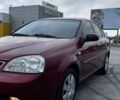 Красный Шевроле Лачетти, объемом двигателя 1.6 л и пробегом 222 тыс. км за 3999 $, фото 8 на Automoto.ua