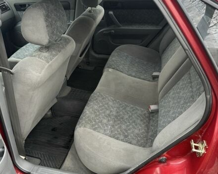 Красный Шевроле Лачетти, объемом двигателя 1.8 л и пробегом 230 тыс. км за 3550 $, фото 6 на Automoto.ua