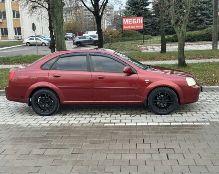 Красный Шевроле Лачетти, объемом двигателя 1.8 л и пробегом 230 тыс. км за 3550 $, фото 2 на Automoto.ua