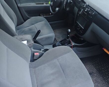 Красный Шевроле Лачетти, объемом двигателя 1.8 л и пробегом 287 тыс. км за 3300 $, фото 5 на Automoto.ua