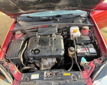 Красный Шевроле Лачетти, объемом двигателя 1.8 л и пробегом 328 тыс. км за 1800 $, фото 2 на Automoto.ua