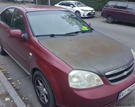 Красный Шевроле Лачетти, объемом двигателя 1.8 л и пробегом 287 тыс. км за 3300 $, фото 3 на Automoto.ua