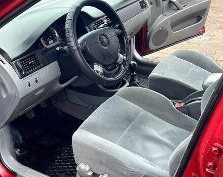 Красный Шевроле Лачетти, объемом двигателя 1.8 л и пробегом 186 тыс. км за 2700 $, фото 7 на Automoto.ua