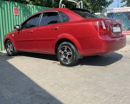 Красный Шевроле Лачетти, объемом двигателя 1.6 л и пробегом 370 тыс. км за 5000 $, фото 4 на Automoto.ua