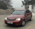 Червоний Шевроле Лачетті, об'ємом двигуна 1.8 л та пробігом 267 тис. км за 3900 $, фото 1 на Automoto.ua