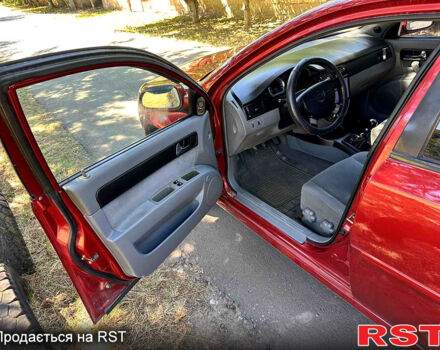 Красный Шевроле Лачетти, объемом двигателя 1.8 л и пробегом 185 тыс. км за 3900 $, фото 9 на Automoto.ua