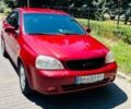 Красный Шевроле Лачетти, объемом двигателя 1.8 л и пробегом 283 тыс. км за 3900 $, фото 1 на Automoto.ua