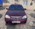 Красный Шевроле Лачетти, объемом двигателя 1.8 л и пробегом 228 тыс. км за 2799 $, фото 1 на Automoto.ua