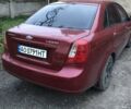 Красный Шевроле Лачетти, объемом двигателя 1.8 л и пробегом 250 тыс. км за 2700 $, фото 2 на Automoto.ua