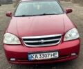 Красный Шевроле Лачетти, объемом двигателя 1.8 л и пробегом 186 тыс. км за 2700 $, фото 1 на Automoto.ua